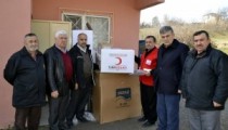 KIZILAY’DAN EVİ YANAN AİLEYE YARDIM